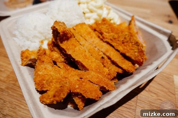 Delicious chicken katsu with rice and macaroni salad from L&L Hawaiian BBQ, a satisfying meal.