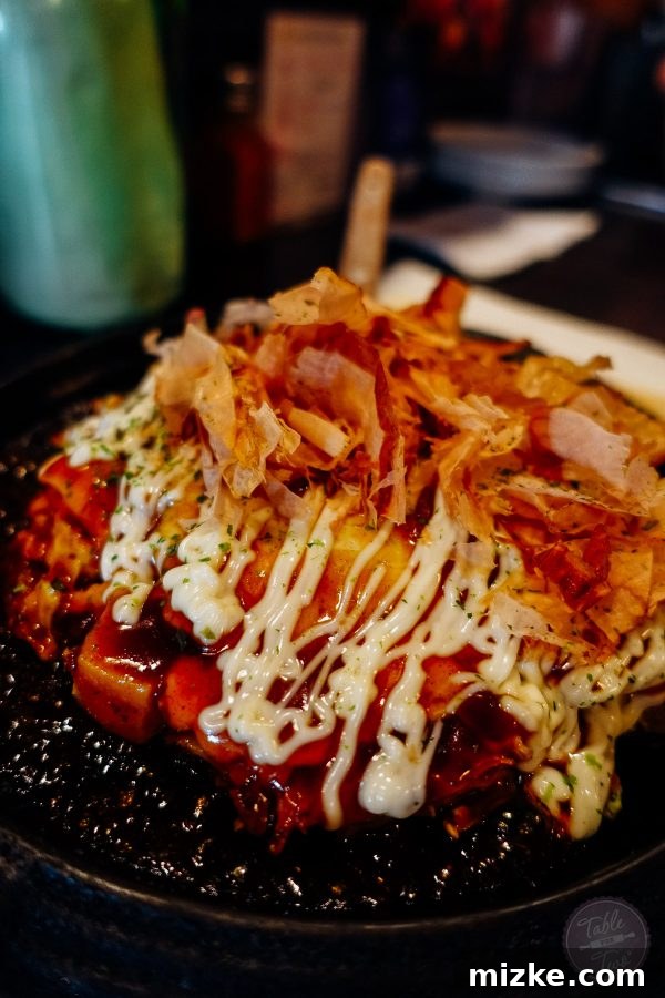 Close-up of the yakisoba toppings, featuring the unique movement of bonito flakes.