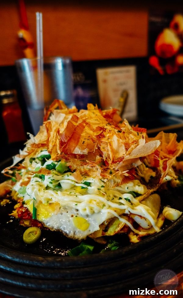 Another view of the hearty yakisoba, showcasing its rich flavors and generous toppings.