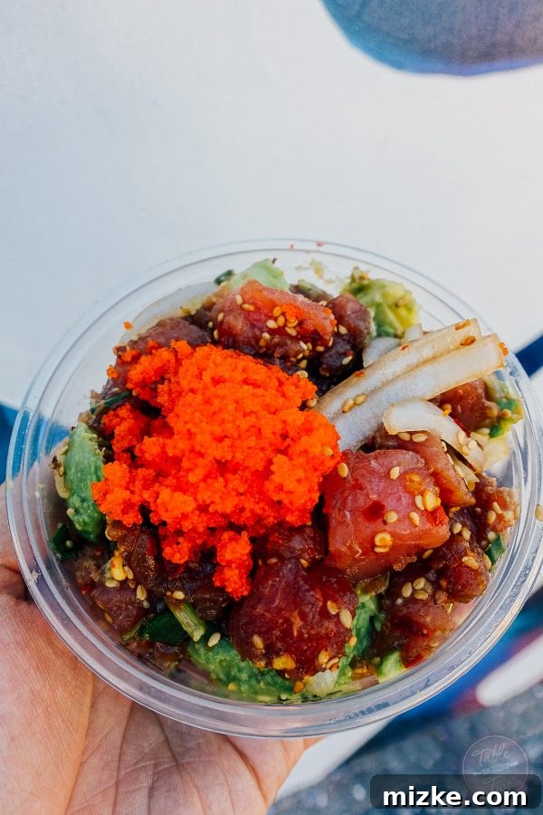 Close-up of a delicious poké bowl, highlighting the fresh ingredients and beautiful presentation.