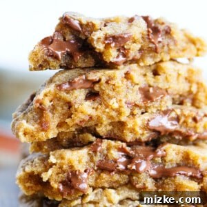 Peanut butter overload cookies are a peanut butter lovers' dream! Studded with Reese's peanut butter cups throughout, this cookie is so soft and perfect for all peanut butter and chocolate lovers!