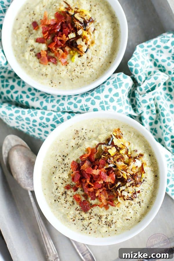 Golden Roasted Broccoli Cauliflower Soup with Savory Bacon Leek Crunch 2 A comforting bowl of creamy roasted broccoli and cauliflower soup, garnished with crispy leeks and savory bacon bits, perfect for cold weather.