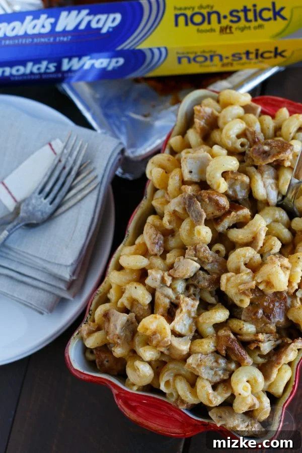 Memphis Soul Mac 4 A classic creamy mac ‘n cheese dish that is amped up with flavor from incorporating Memphis-Style chicken throughout!