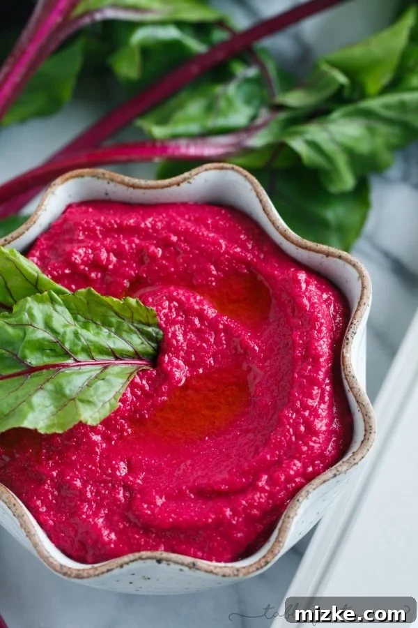 Beetroot Bliss 5 Your tastebuds won't miss a beet when you make this beet hummus! Its vibrant color will attract anyone over to dip to their heart's content!