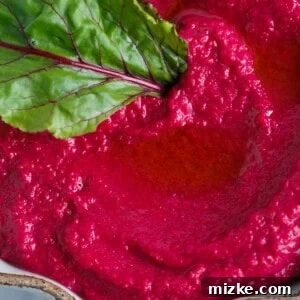Your tastebuds won't miss a beet when you make this beet hummus! Its vibrant color will attract anyone over to dip to their heart's content!