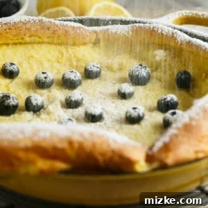 Zesty Blueberry Puff Pancake 5 Lemon Blueberry Dutch Baby, ready for serving