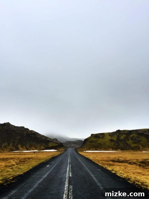 Iceland's Golden Circle in Five Unforgettable Days 19 A solitary road stretching into the Icelandic horizon