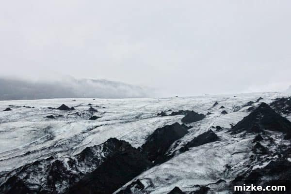 Five Days in Iceland The Vík Experience 8 A group of people on a guided glacier walk, with the stunning Icelandic landscape in the background