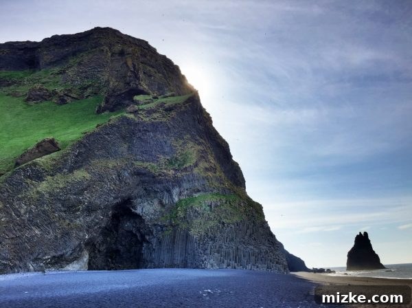 Iceland's Glacial Jewel: A 5-Day Jökulsárlón Exploration 2 Dramatic Basalt Columns at Reynisfjara Black Sand Beach in Vík, Iceland