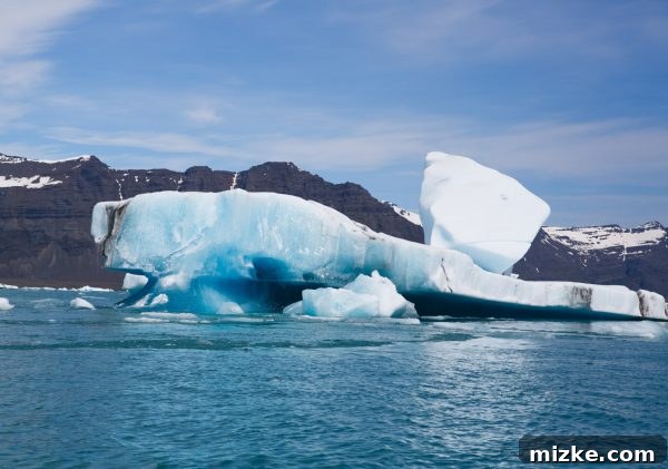 Iceland's Glacial Jewel: A 5-Day Jökulsárlón Exploration 11 Zodiac boat navigating through icebergs on Jökulsárlón Glacier Lagoon