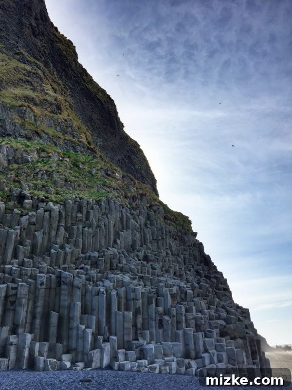 Iceland's Glacial Jewel: A 5-Day Jökulsárlón Exploration 3 Close-up of Reynisdrangar Basalt Sea Stacks at Reynisfjara