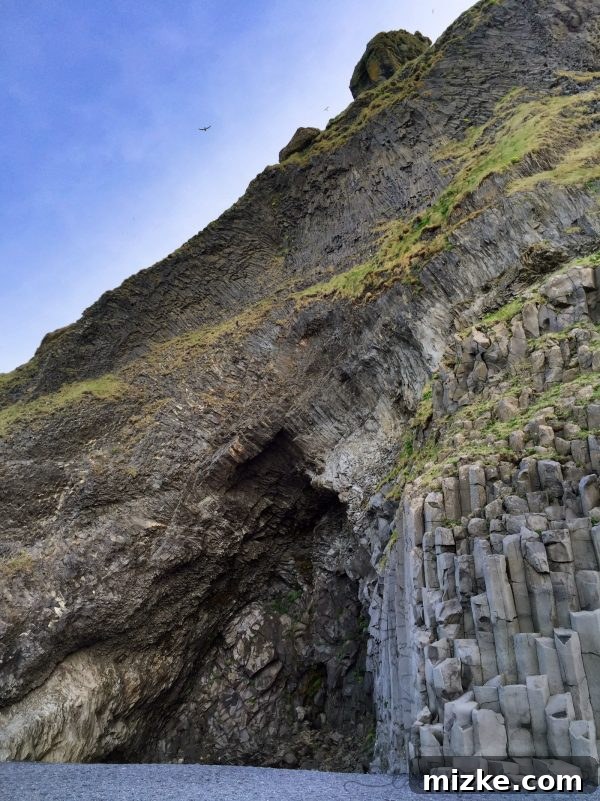 Iceland's Glacial Jewel: A 5-Day Jökulsárlón Exploration 4 Panoramic view of Reynisfjara Black Sand Beach with Basalt Columns
