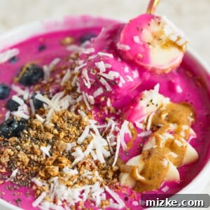 This pitaya smoothie bowl will brighten anyone's day! Just look at the COLOR!!