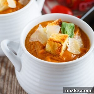 A gorgeous creamy and smooth fire-roasted tomato, pumpkin, and corn soup that uses Hunt's fire-roasted diced tomatoes. The flavors go so well together and it's the perfect compliment to add to your dinner table. Serve with some crusty bread and you've got yourself a comforting and healthy meal!
