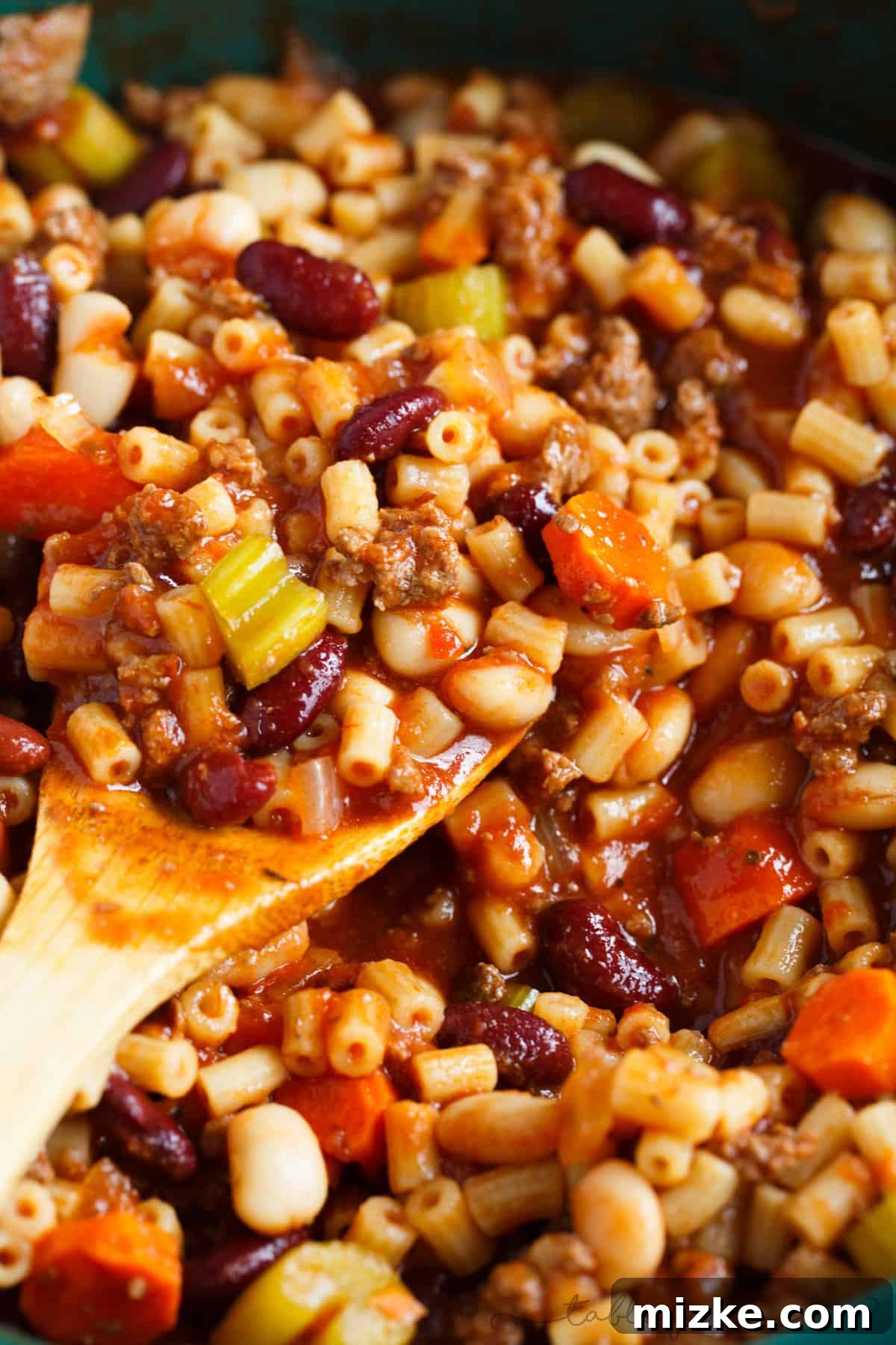 Hearty Slow Cooked Pasta Fagioli 2 A thick and hearty slow cooker meal. This slow cooker pasta fagioli is full of hearty beef, beans, veggies, and pasta. Makes for great comfort food in the cooler months or for busy weeks that leftovers won't get boring!