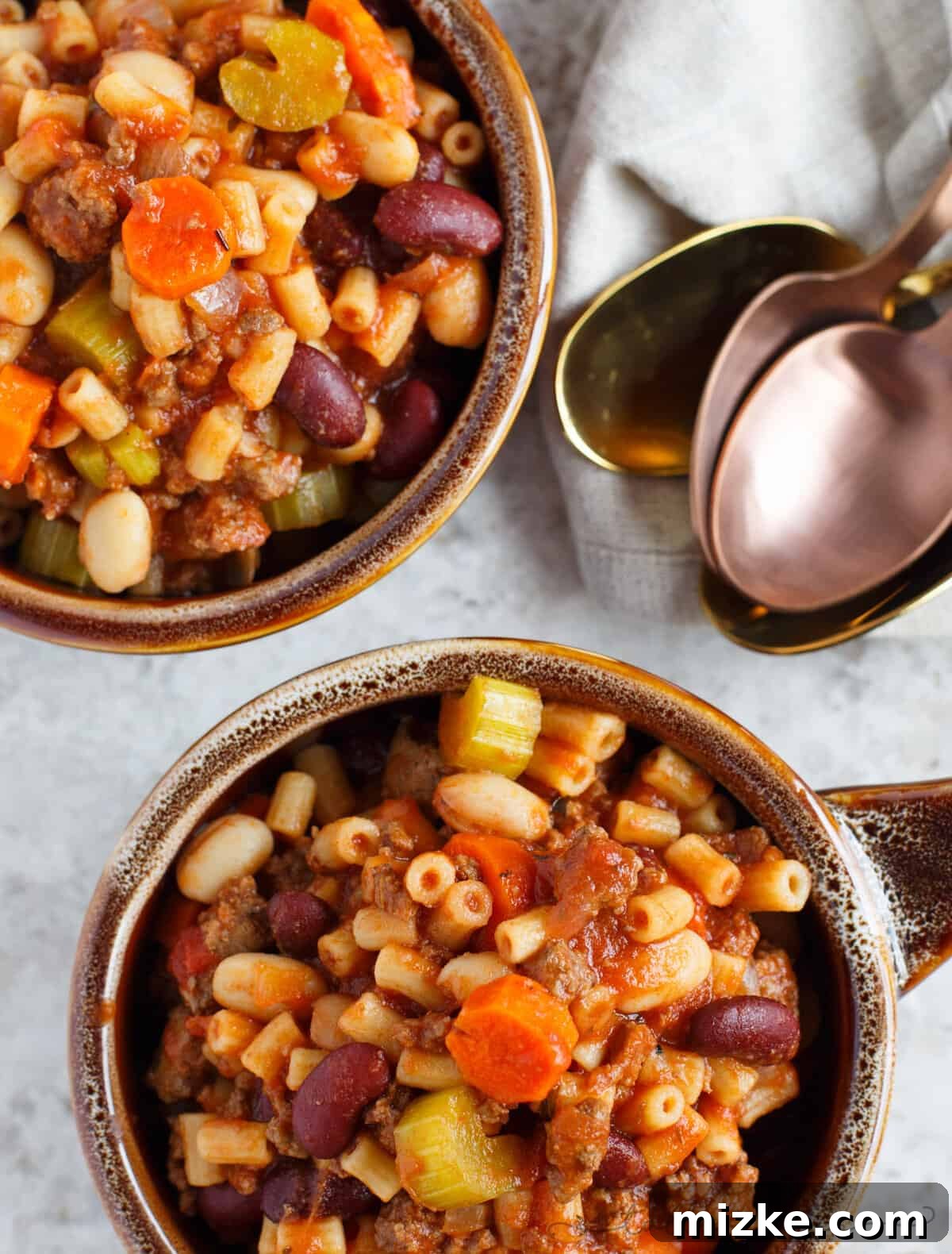 Hearty Slow Cooked Pasta Fagioli 3 A thick and hearty slow cooker meal. This slow cooker pasta fagioli is full of hearty beef, beans, veggies, and pasta. Makes for great comfort food in the cooler months or for busy weeks that leftovers won't get boring!