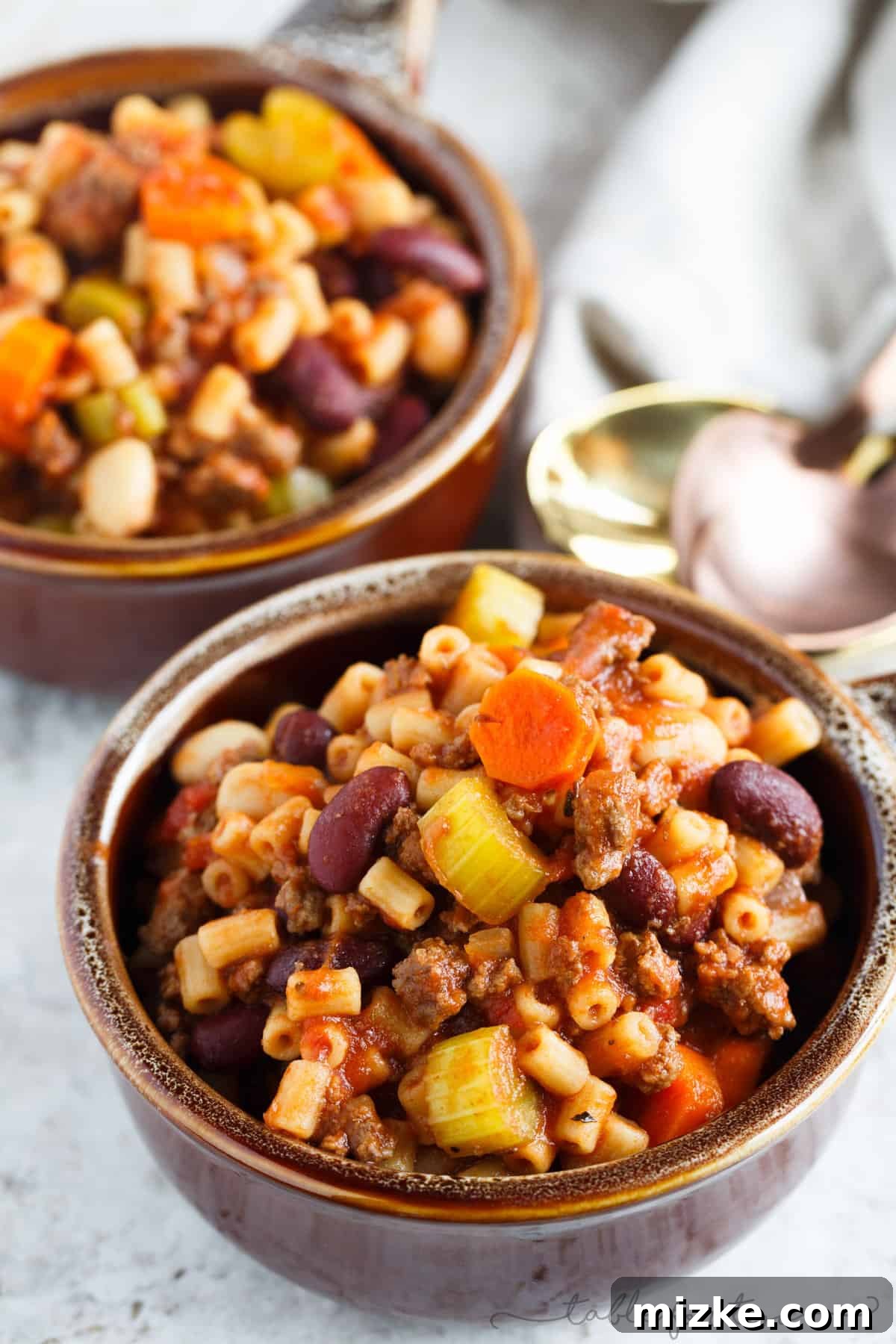 Hearty Slow Cooked Pasta Fagioli 4 A thick and hearty slow cooker meal. This slow cooker pasta fagioli is full of hearty beef, beans, veggies, and pasta. Makes for great comfort food in the cooler months or for busy weeks that leftovers won't get boring!