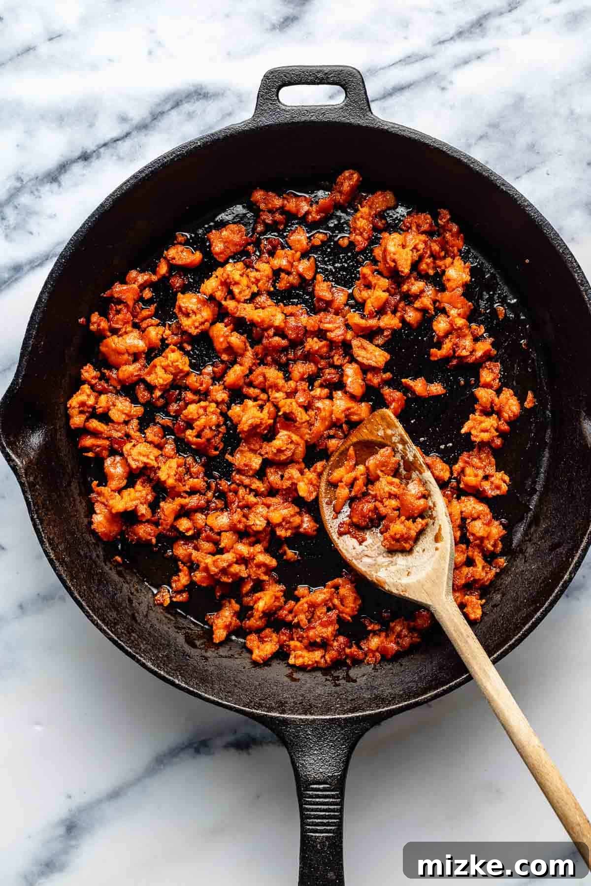 Easy to make and a bit too easy to eat, chili cheese dip is creamy, cheesy, and just the right amount of spicy from the chorizo and jalapeno. Browning chorizo in a skillet.