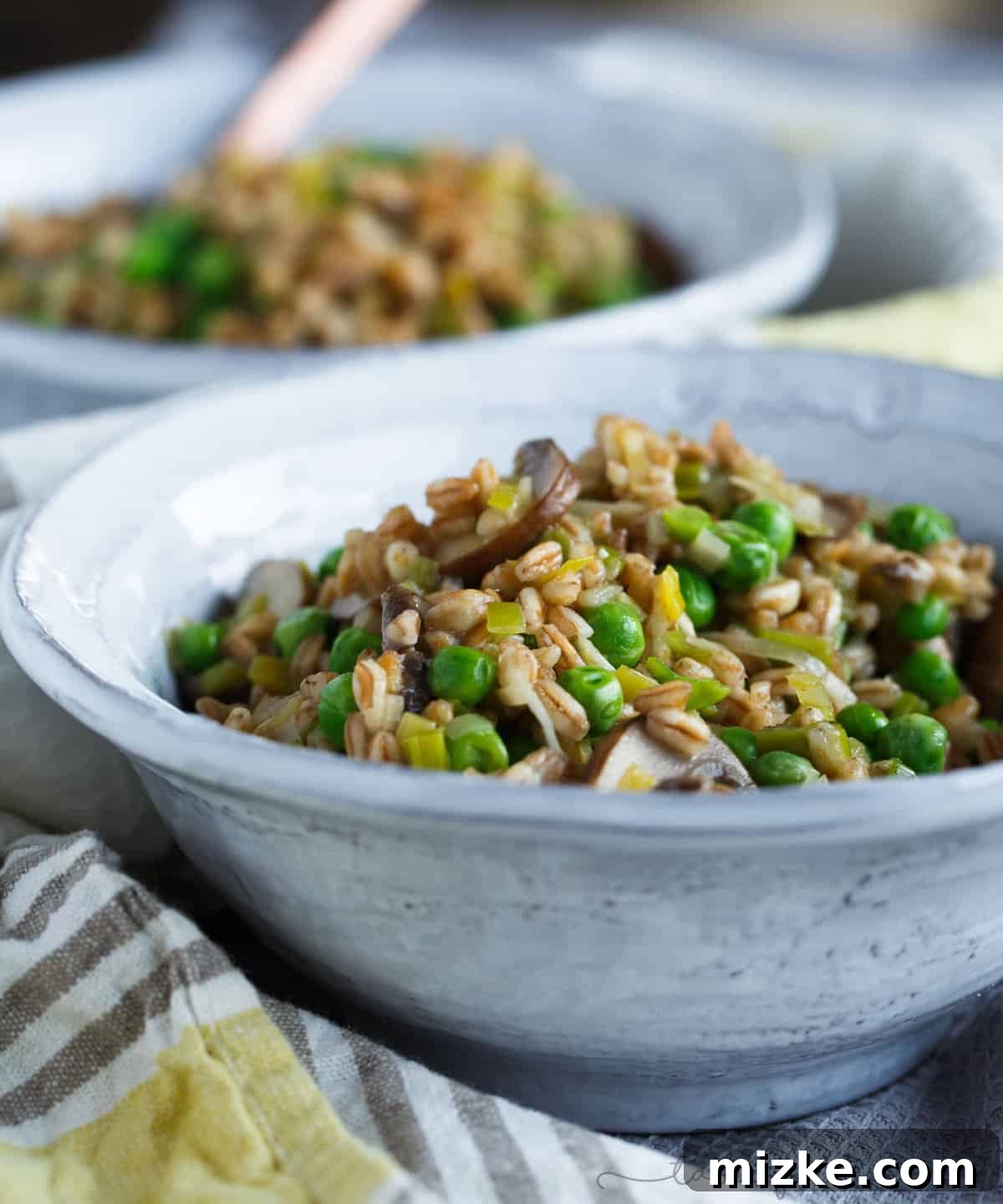 Wholesome Leek Mushroom and Pea Farro 5 A great way to use farro in this flavorful dish! Filled with leeks, mushrooms, peas, and lots of parmesan cheese; this cozy farro dish is a quick one to whip up anytime of the week!
