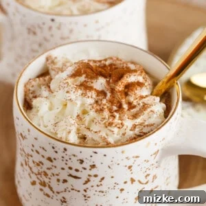 A beautifully presented spicy gingerbread latte, perfect for a festive occasion.