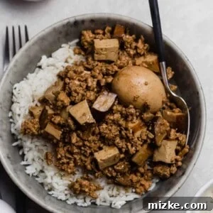 Bowl of minced pork served over rice.