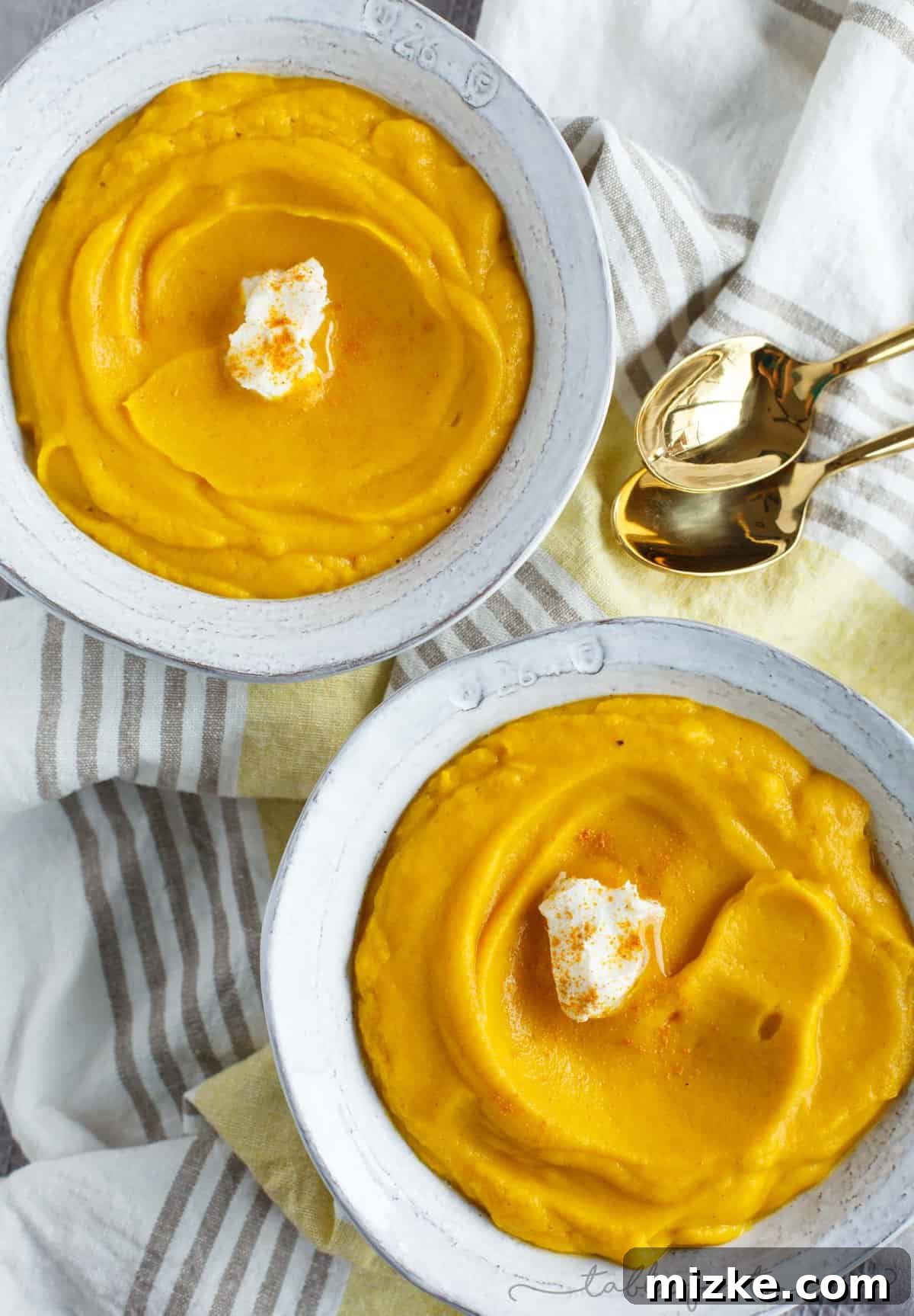 Golden Root Harmony Soup 3 Close-up shot of the rich orange-yellow color of the sweet potato, parsnip, ginger, and turmeric soup, highlighting its smooth, creamy, and inviting texture.