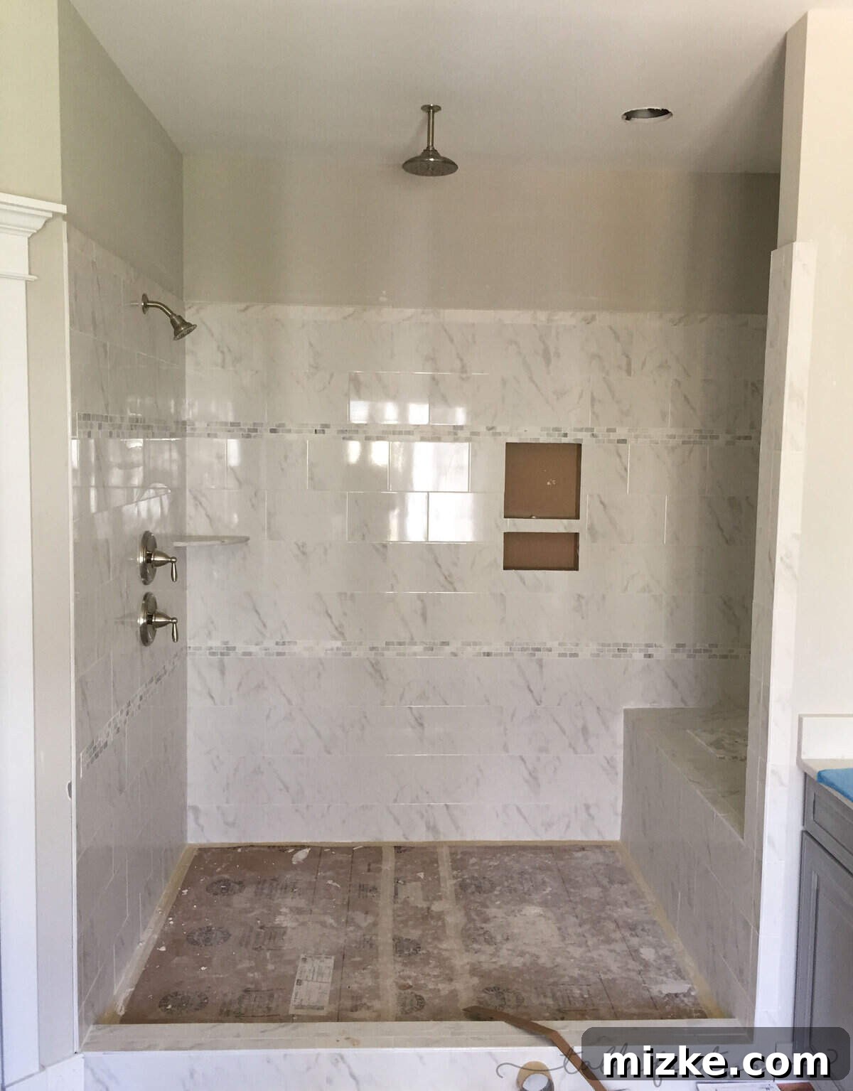 The Final Push 9 Spacious and luxurious walk-in shower in a master bathroom of a new custom build.
