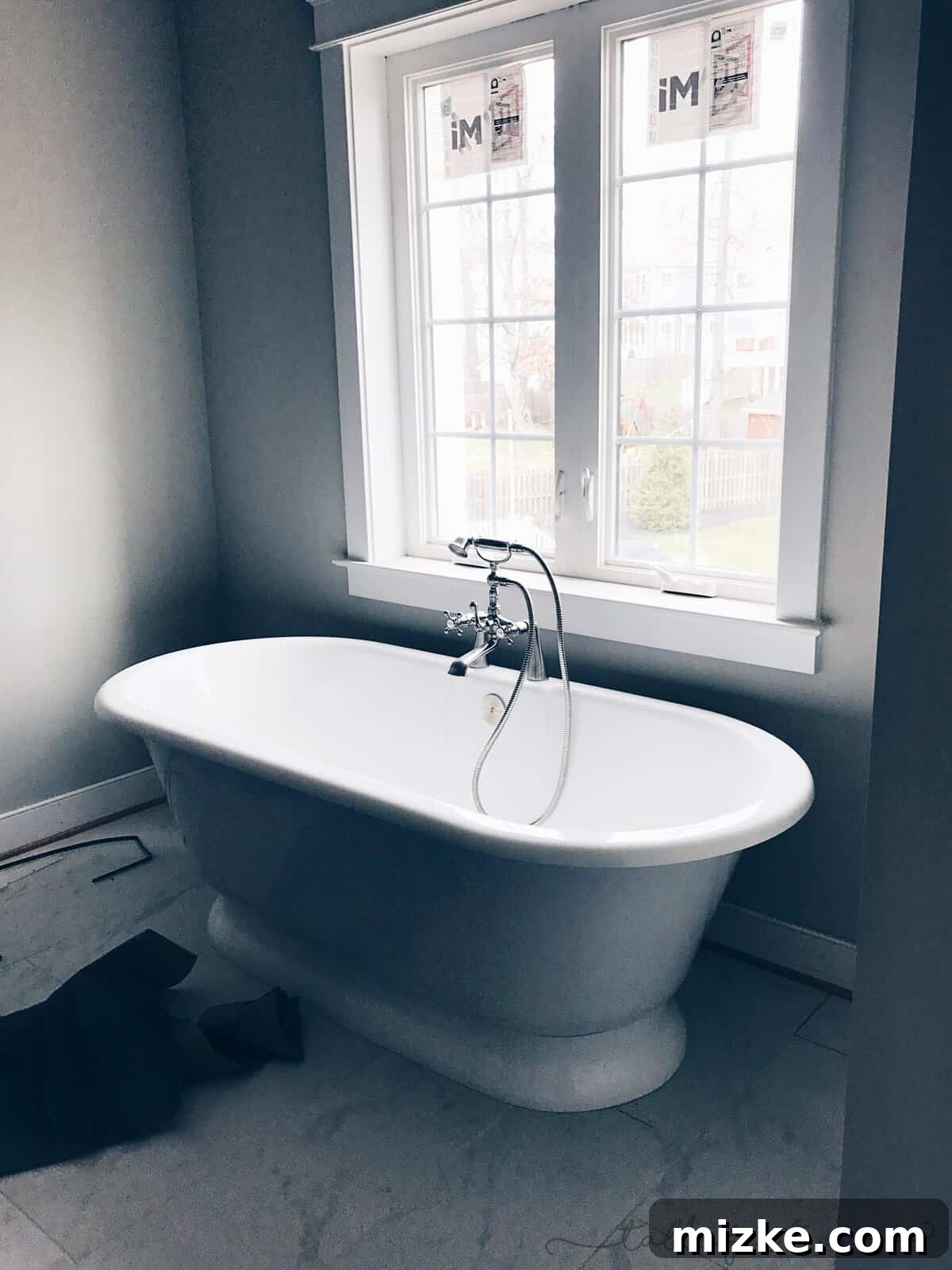 The Final Push 10 Beautiful freestanding tub in a modern master bathroom, enhancing the spa-like atmosphere.