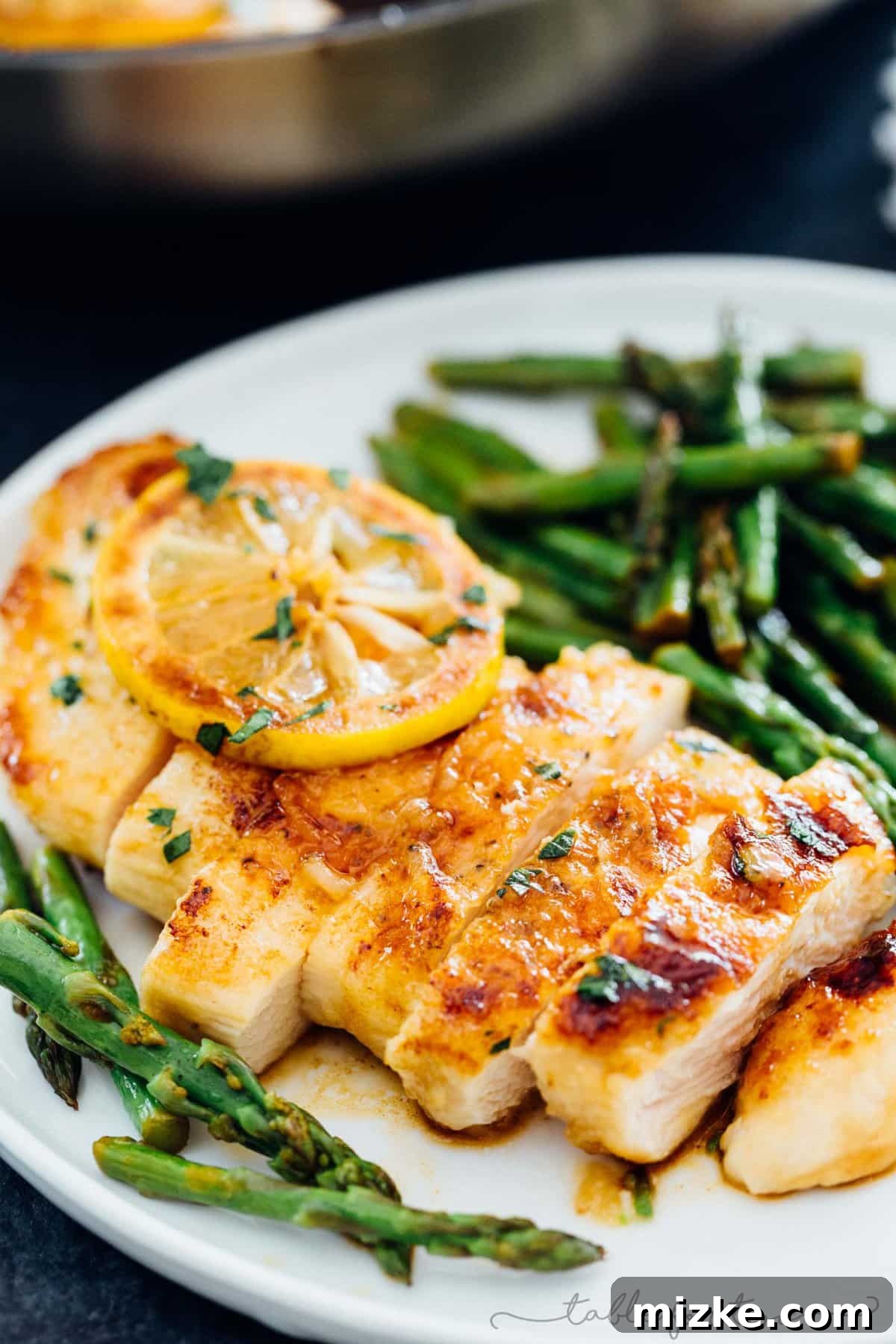Zesty Honey Butter Chicken with Tender Asparagus 5 The finished Honey Butter Lemon Chicken and Asparagus, hot and ready to serve.