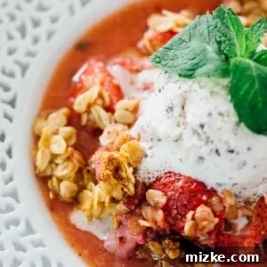 A quick and easy way to use up all your fresh mint from the garden and the fresh strawberries of the season! Strawberry mint crisp is an easy dessert with the most flavorful crisp topping! Don't forget the ice cream scoop on top!