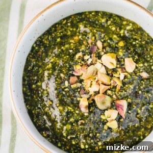 This pistachio mint pesto has so much robust flavor and is a great topping for all grilled meats, pasta, and any sort of dipping or cheese and meat platter!