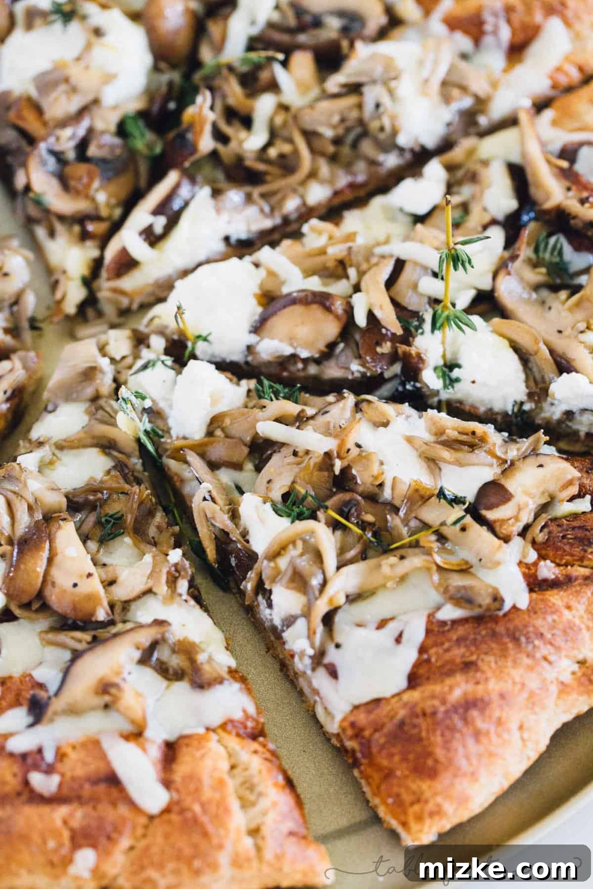 Mushroom lovers will be in paradise with this triple mushroom and herb grilled pizza! The earthy and hearty mushrooms on top of this pizza pair perfectly with the creamy ricotta and mozzarella cheese!