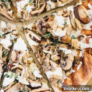 Mushroom lovers will be in paradise with this triple mushroom and herb grilled pizza! The earthy and hearty mushrooms on top of this pizza pair perfectly with the creamy ricotta and mozzarella cheese!