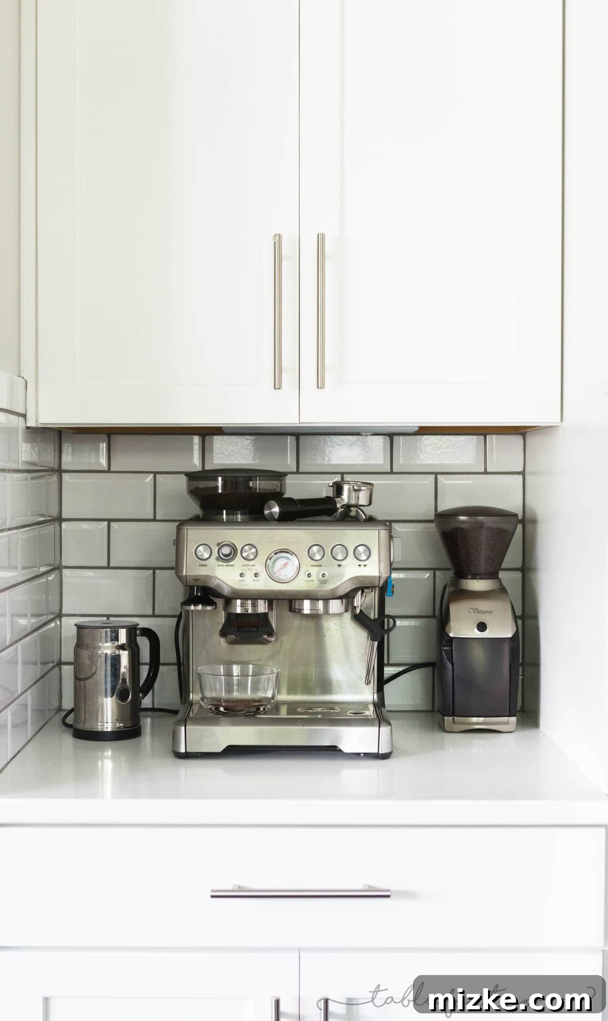 Welcome to My Kitchen 5 A dedicated coffee nook in a modern kitchen, featuring an espresso maker and coffee supplies, perfectly organized.