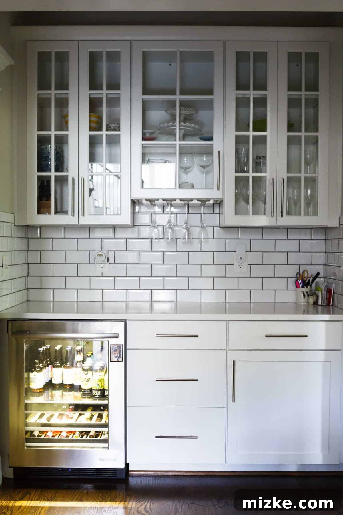 Welcome to My Kitchen 9 A stylish butler's pantry with a beverage center, open shelving, and stemware holders, perfect for entertaining.