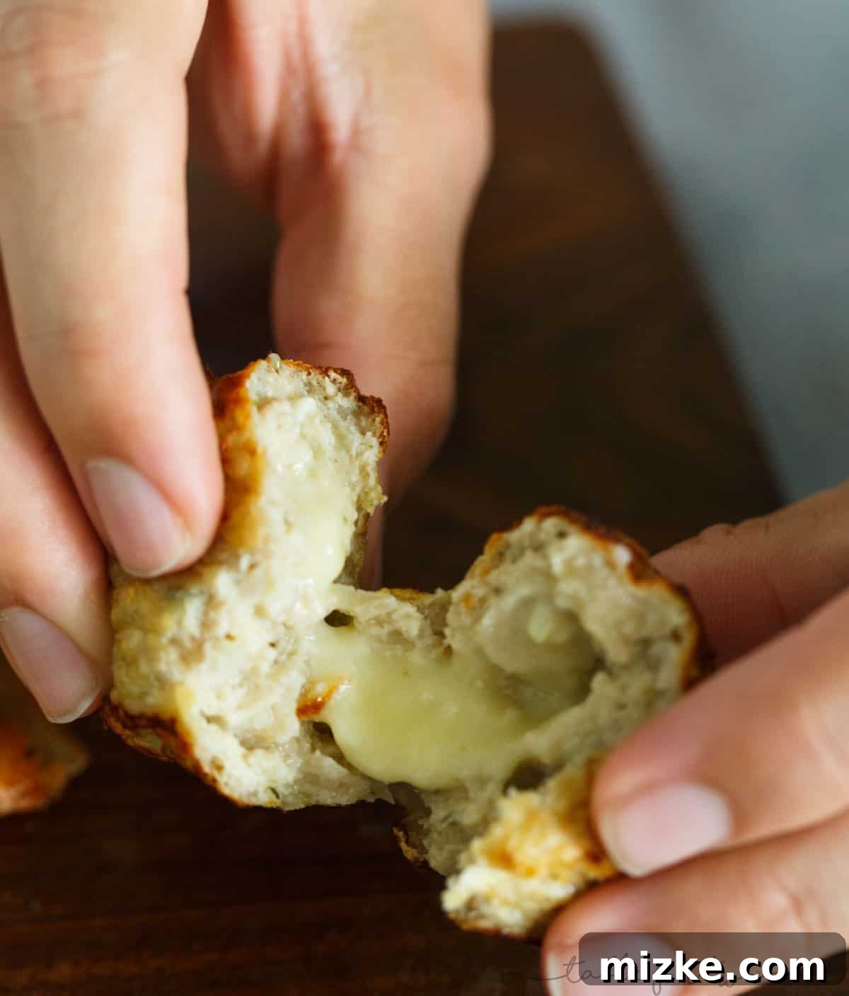 Autumn Harvest Chicken Meatballs with Apple Sage and a Cheesy Core 5 Close-up of a perfectly cooked chicken apple and sage meatball with a gooey brie filling