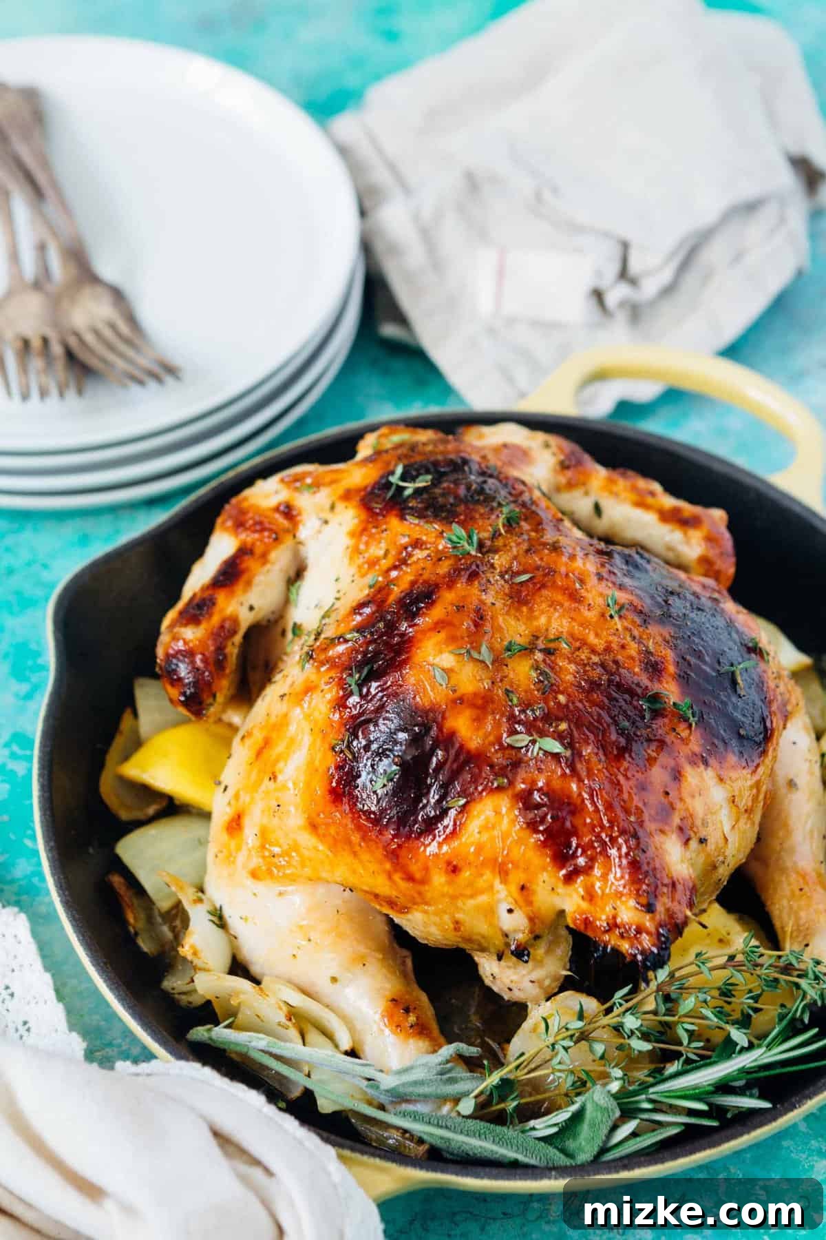 Honey Butter Herb Roasted Pressure Cooker Chicken 5 A perfectly cooked whole chicken, infused with herbs and honey butter, is gently lifted from the pressure cooker, its meat tender and ready for its final broil to crisp the skin.