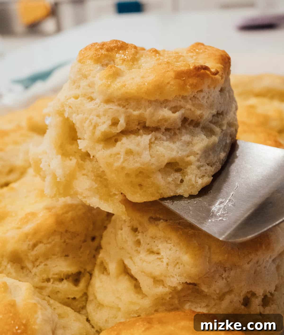 Joanna Gaines' Fluffy Buttery Biscuits: The Ultimate Homemade Recipe for Breakfast Perfection You'll want these biscuits on your breakfast table! They're so fluffy, buttery, and incredibly tender. You won't be able to just eat one! #biscuits #breakfast #breakfastrecipes