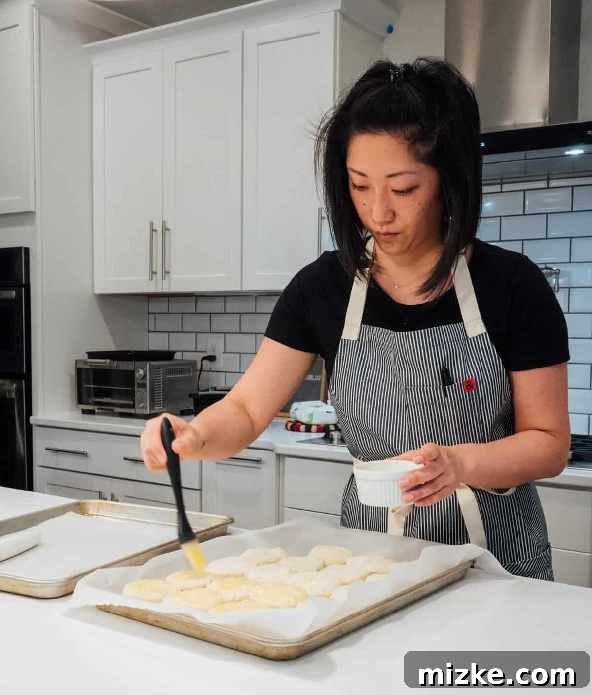 Joanna Gaines' Fluffy Buttery Biscuits: The Ultimate Homemade Recipe for Breakfast Perfection You'll want these biscuits on your breakfast table! They're so fluffy, buttery, and incredibly tender. You won't be able to just eat one! #biscuits #breakfast #breakfastrecipes