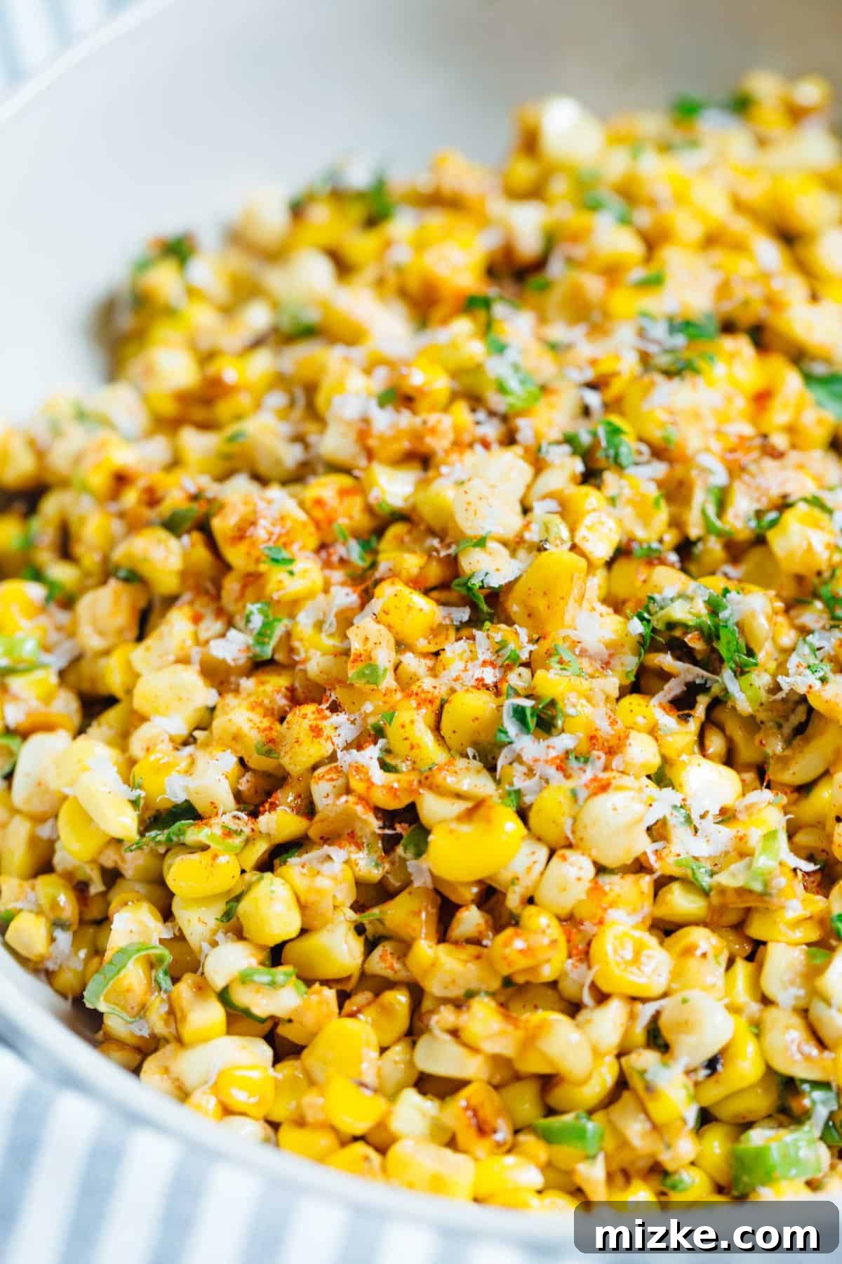 A less messy way to eat Mexican street corn! This Mexican street corn off the cob is one you'll want to make for all your parties year-round! #mexicanstreetcorn #corn #mexican #sidedish #cornrecipe A less messy way to eat Mexican street corn! This Mexican street corn off the cob is one you'll want to make for all your parties year-round! #mexicanstreetcorn #corn #mexican #sidedish #cornrecipe