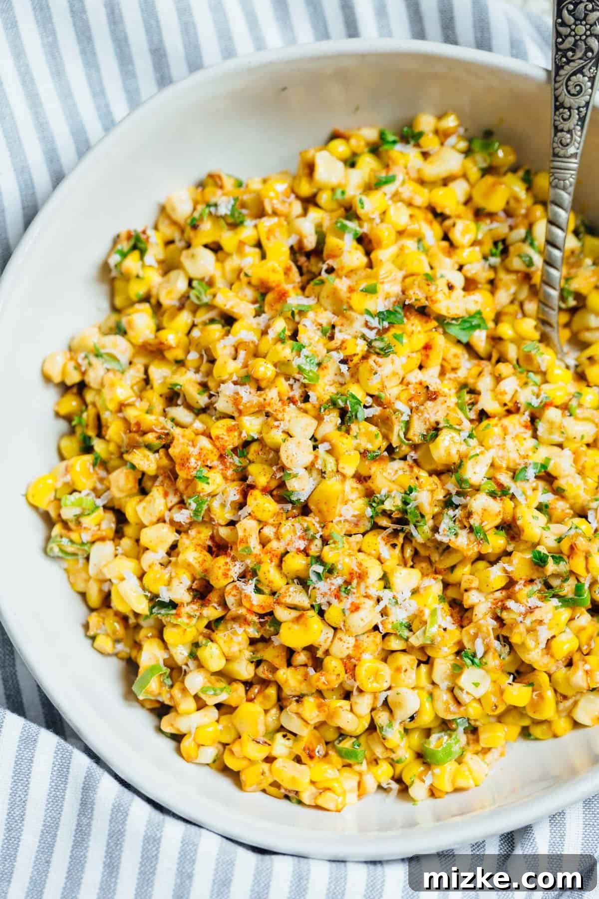 A less messy way to eat Mexican street corn! This Mexican street corn off the cob is one you'll want to make for all your parties year-round! #mexicanstreetcorn #corn #mexican #sidedish #cornrecipe A less messy way to eat Mexican street corn! This Mexican street corn off the cob is one you'll want to make for all your parties year-round! #mexicanstreetcorn #corn #mexican #sidedish #cornrecipe