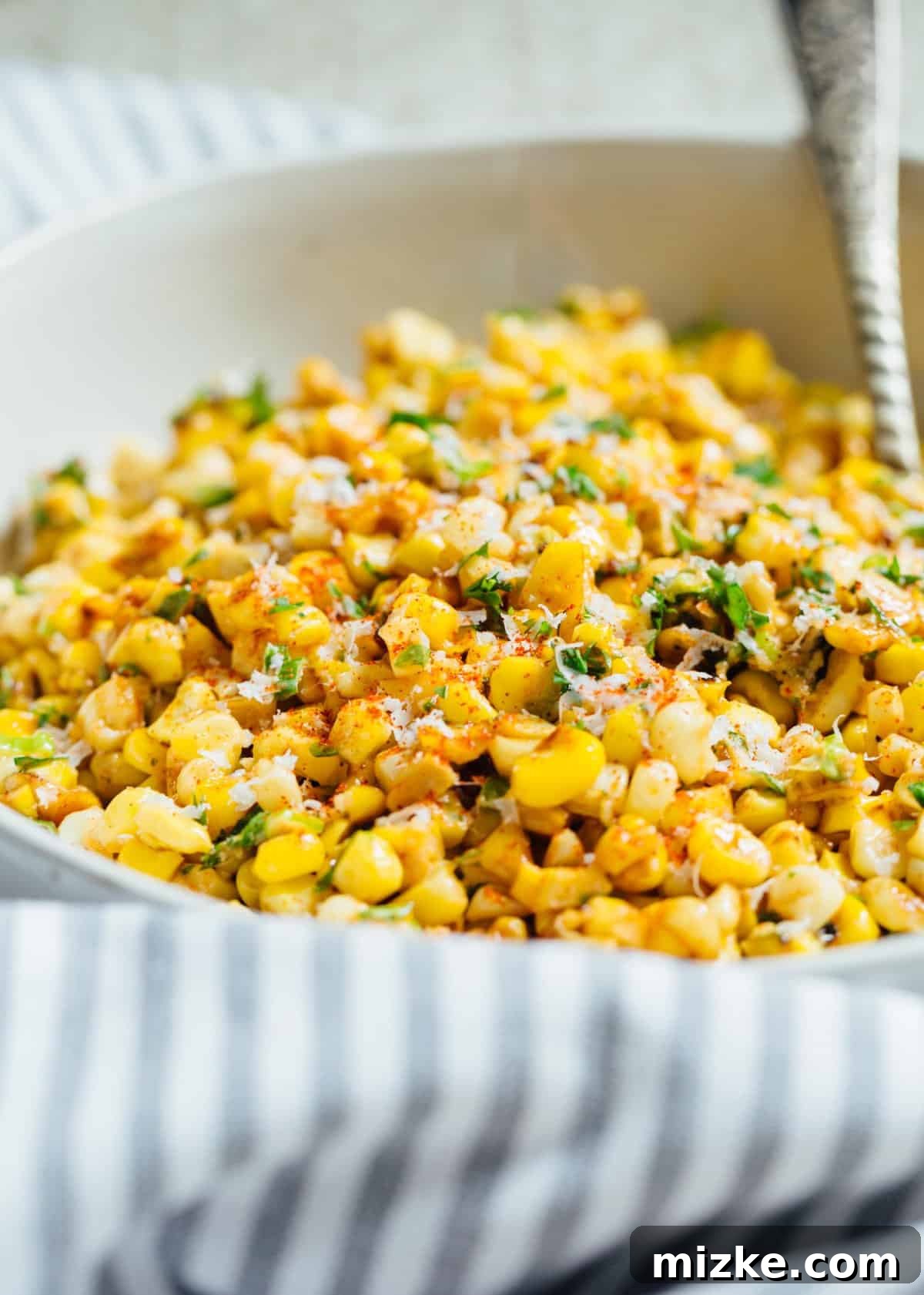 A less messy way to eat Mexican street corn! This Mexican street corn off the cob is one you'll want to make for all your parties year-round! #mexicanstreetcorn #corn #mexican #sidedish #cornrecipe A less messy way to eat Mexican street corn! This Mexican street corn off the cob is one you'll want to make for all your parties year-round! #mexicanstreetcorn #corn #mexican #sidedish #cornrecipe
