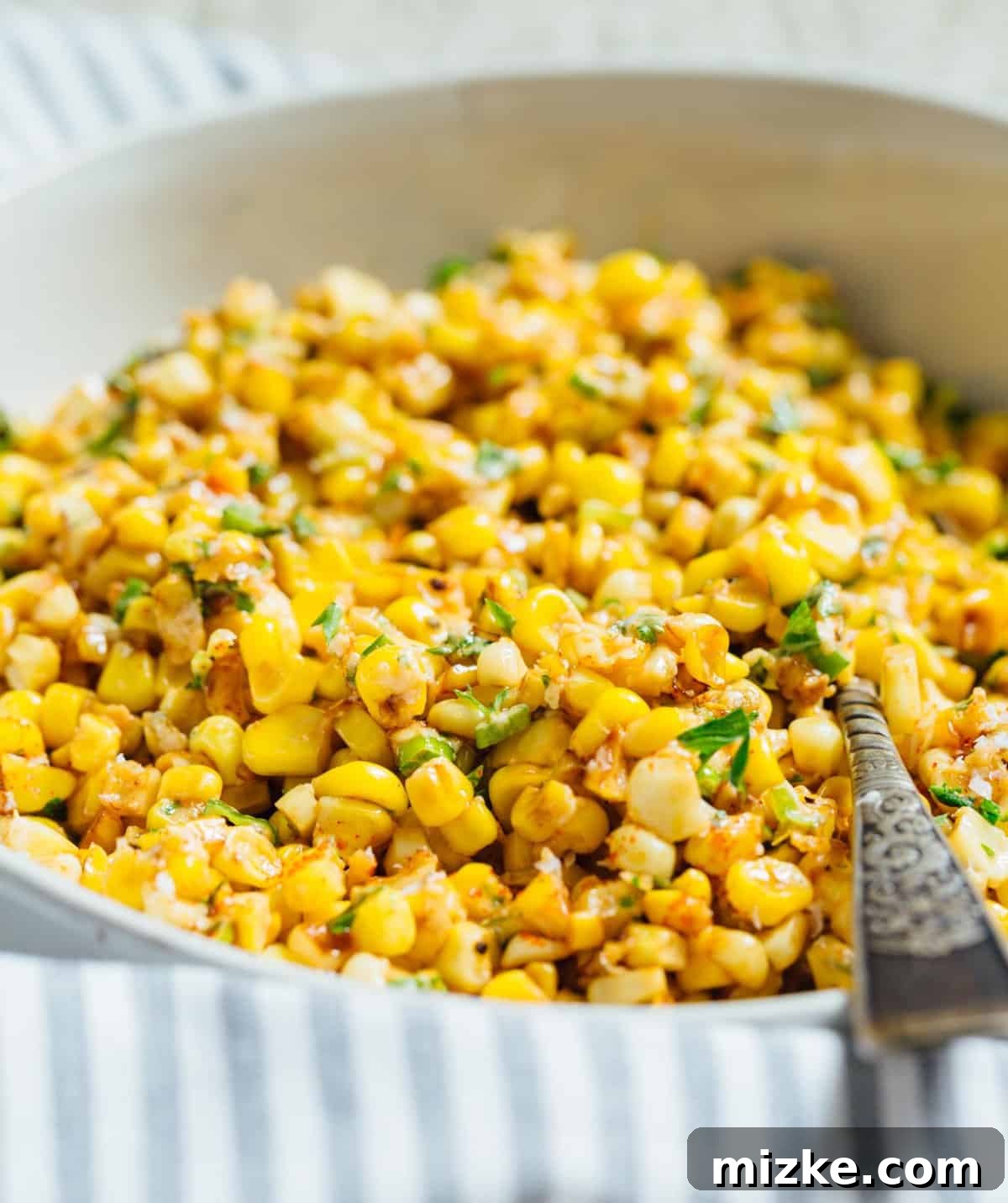 A less messy way to eat Mexican street corn! This Mexican street corn off the cob is one you'll want to make for all your parties year-round! #mexicanstreetcorn #corn #mexican #sidedish #cornrecipe A less messy way to eat Mexican street corn! This Mexican street corn off the cob is one you'll want to make for all your parties year-round! #mexicanstreetcorn #corn #mexican #sidedish #cornrecipe