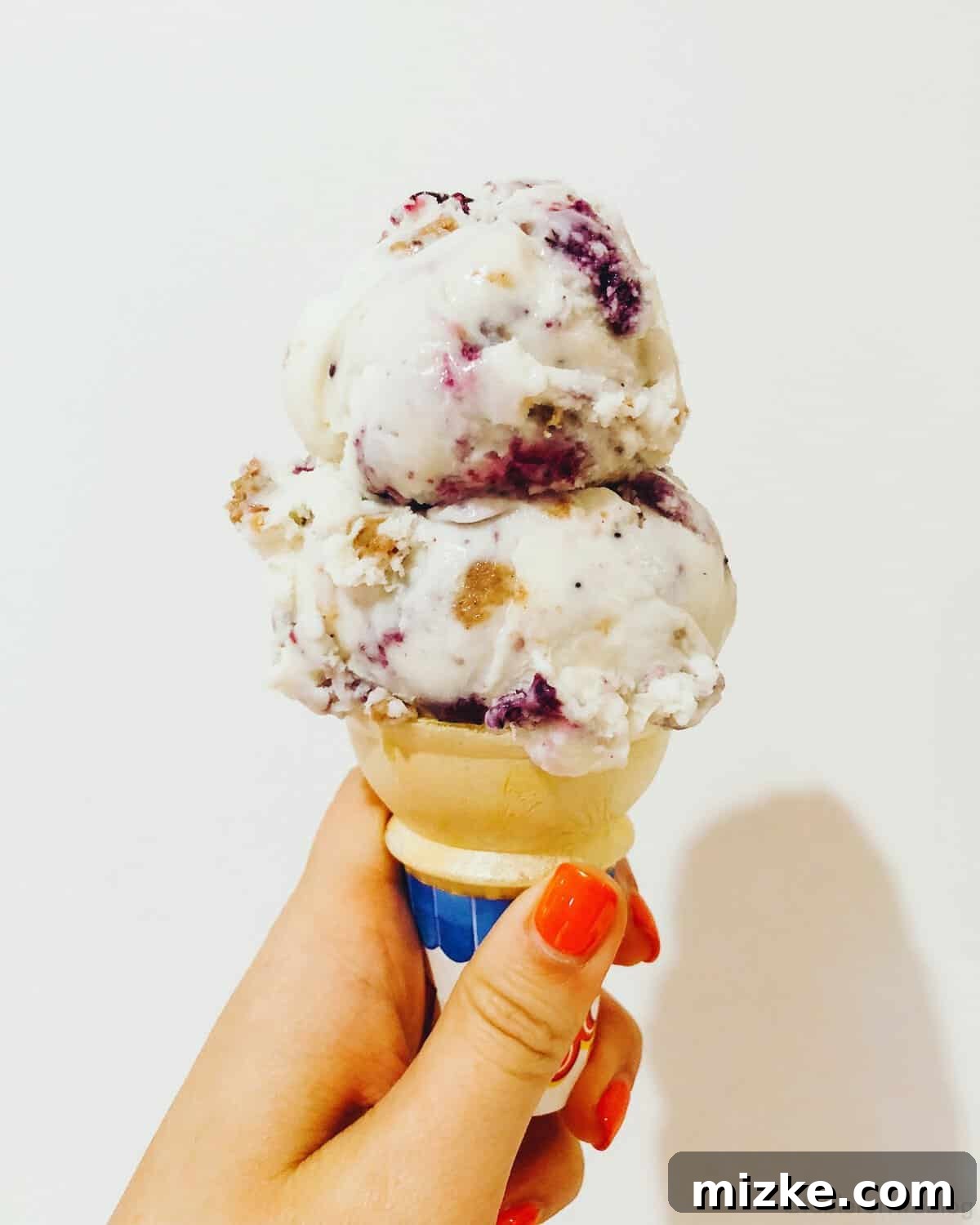 Your Ultimate Guide to Woodstock Vermont 9 Delicious ice cream cone with generous toppings, possibly blueberry oat crumble flavor