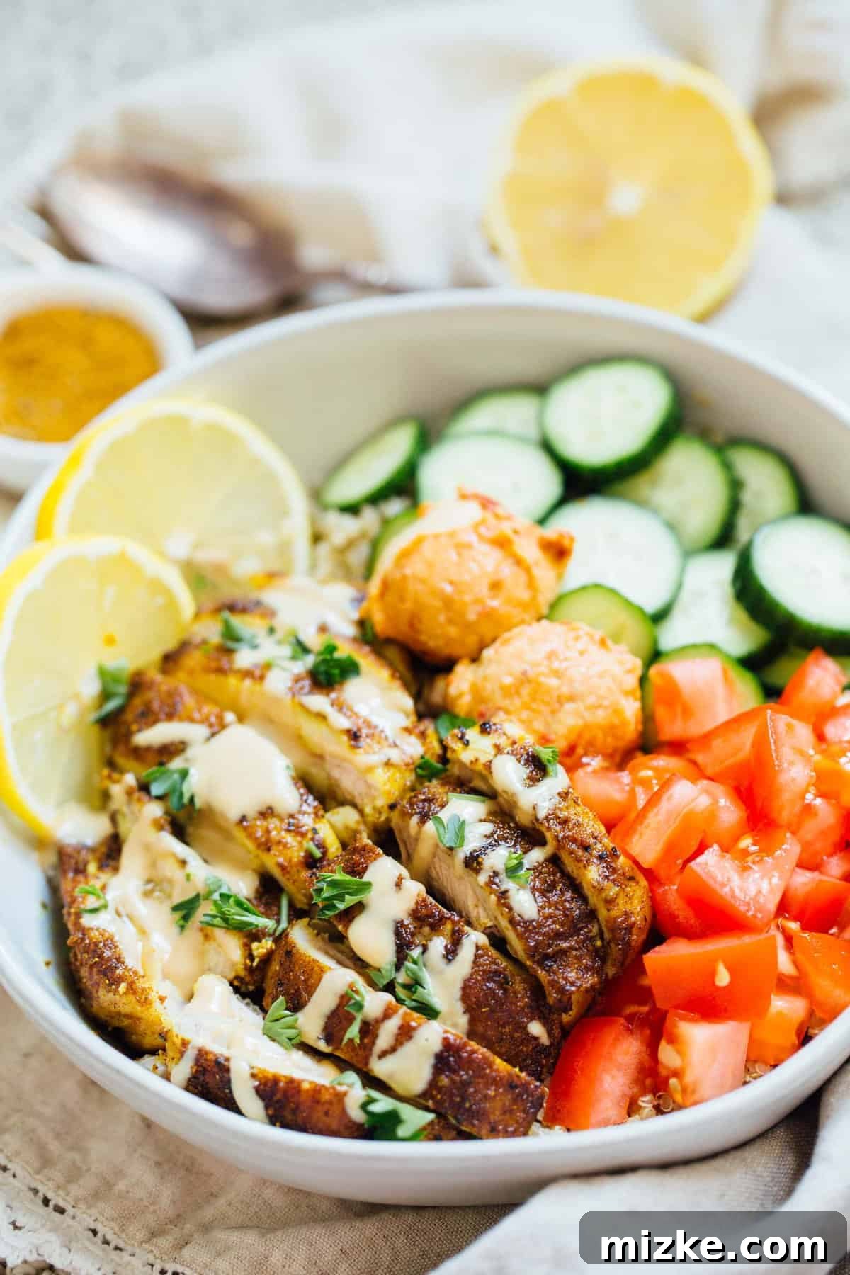 Savory Chicken Shawarma and Quinoa Bowl Close-up of a vibrant chicken shawarma quinoa bowl ready to be enjoyed