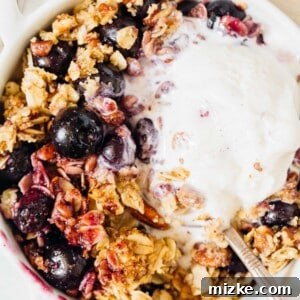 This blueberry pecan crumble is effortless to put together but it is an exceptional dessert to have to finish off any dinner party or get-together! #blueberrycrumble #blueberrypecan #blueberry #pecan #blueberrydessert #dessert #summerdessert