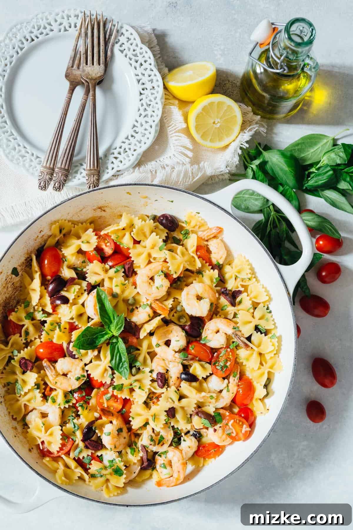 Zesty Mediterranean Shrimp Farfalle 2 A beautifully presented bowl of Mediterranean Farfalle Toss with Shrimp, featuring tender pasta, succulent shrimp, vibrant tomatoes, and fresh herbs.