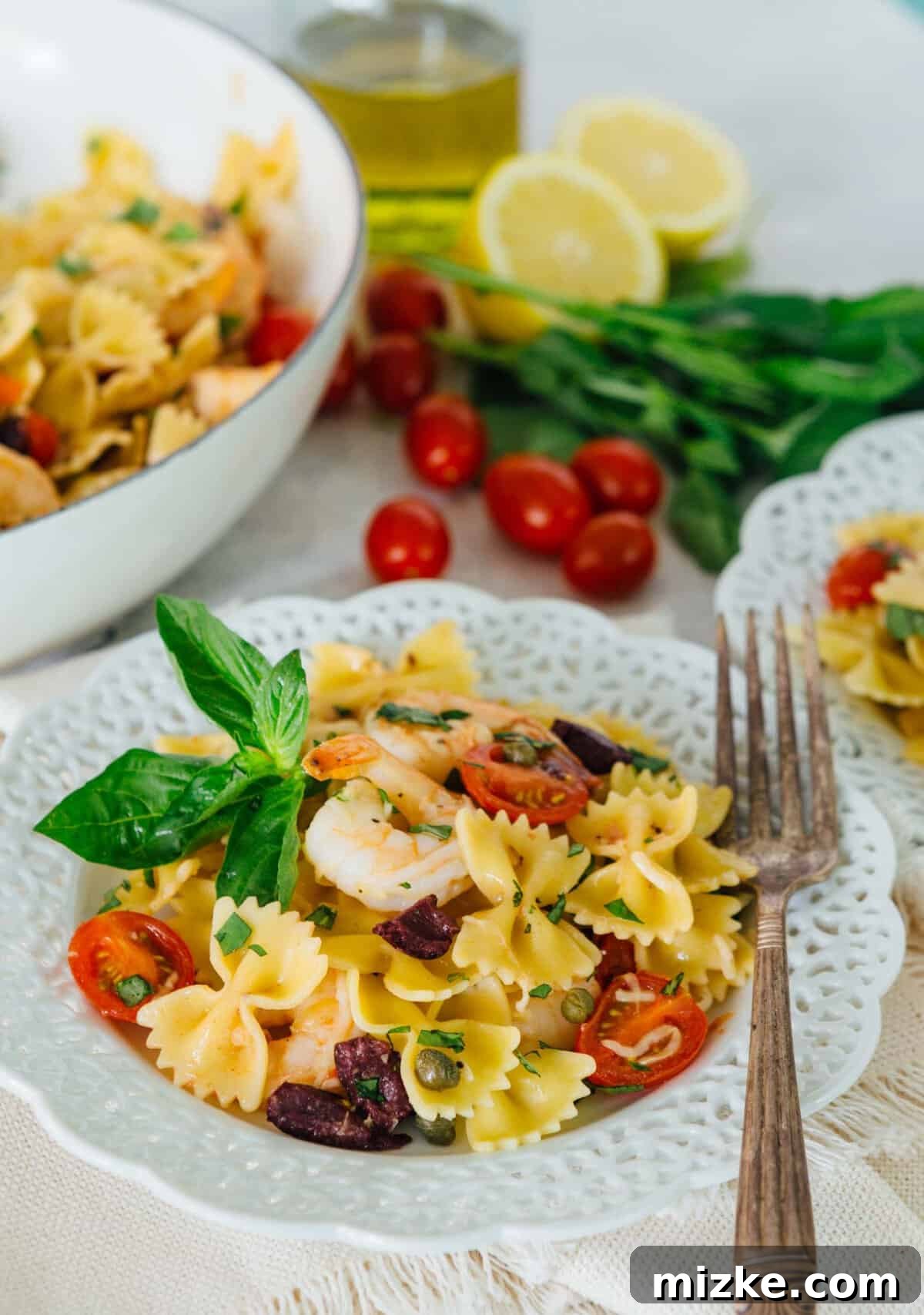 Zesty Mediterranean Shrimp Farfalle 3 Fresh shrimp and vibrant grape tomatoes ready to be tossed with al dente farfalle pasta for a healthy Mediterranean meal.