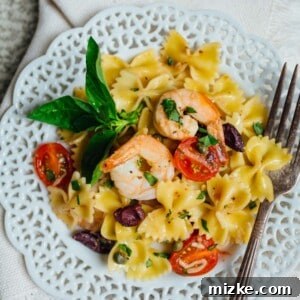 Mediterranean Farfalle Toss with Shrimp, a light and refreshing pasta dish.