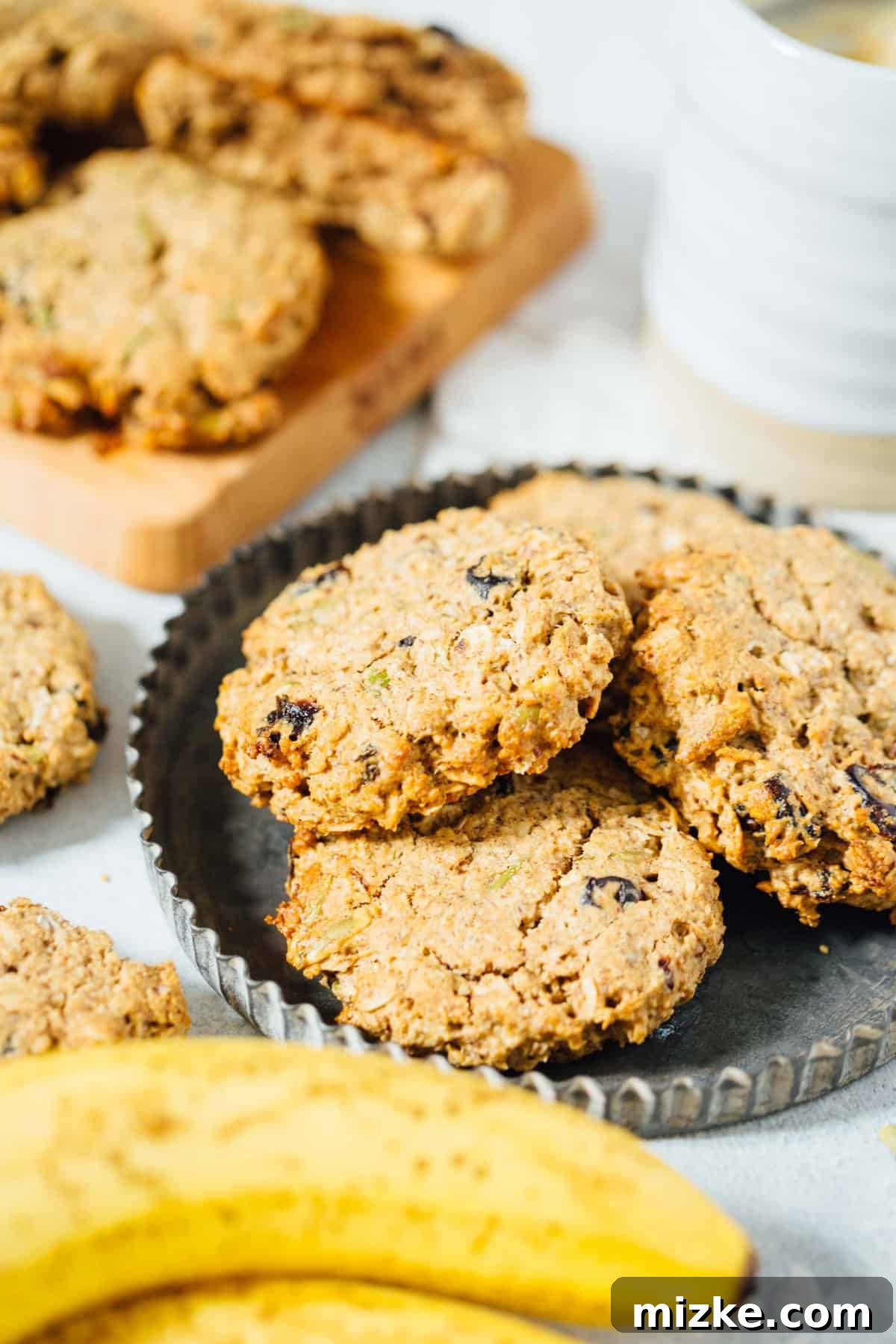 Wholesome Gluten-Free Breakfast Cookies A single naturally sweetened vegan and gluten-free breakfast cookie, showcasing its rustic texture and wholesome ingredients. Ideal for a healthy breakfast or snack.